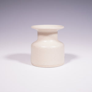Wheel thrown ceramic mini vase with hand-painted daffodil underglaze design. (Back View)