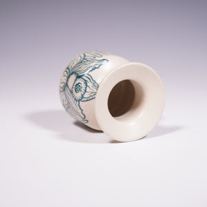Wheel thrown ceramic mini vase with hand-painted daffodil underglaze design. (Top View)