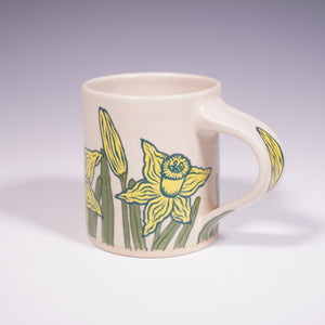 Wheel Thrown Ceramic Mug with Hand-Painted daffodil design. (Back View)