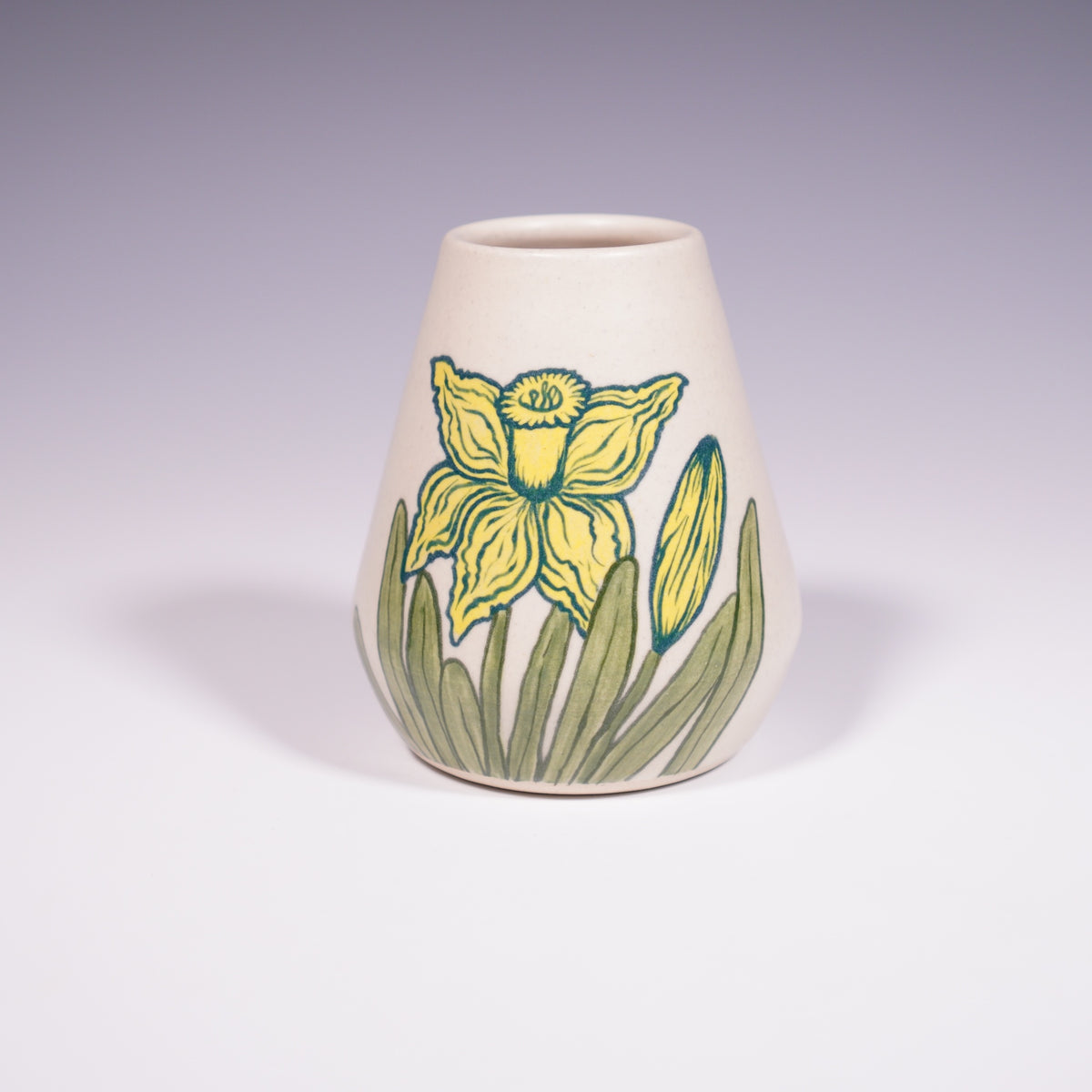 Wheel Thrown Ceramic Jar with Hand-Painted daffodil design. (Front View)