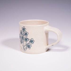 Wheel Thrown Ceramic Mug with Hand-painted Forget Me Nots Design. (Back View)