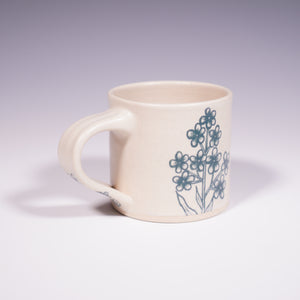 Wheel Thrown Ceramic Mug with Hand-painted Forget Me Nots Design. (Front View)