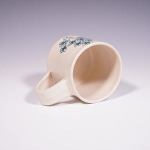 Wheel Thrown Ceramic Mug with Hand-painted Forget Me Nots Design. (Top View)