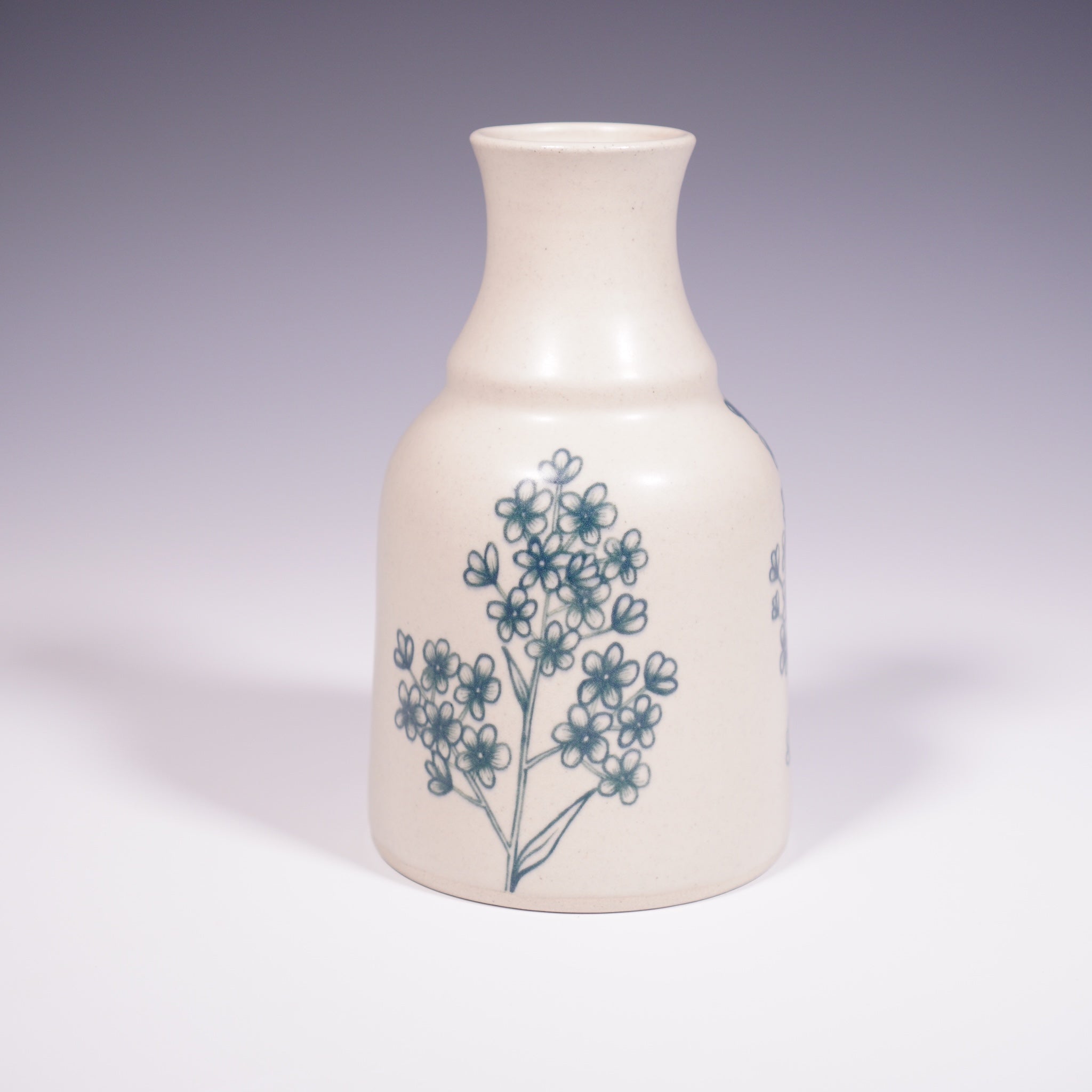 Wheel Thrown Ceramic Vase with Hand-painted Forget Me Nots Design. (Front View)