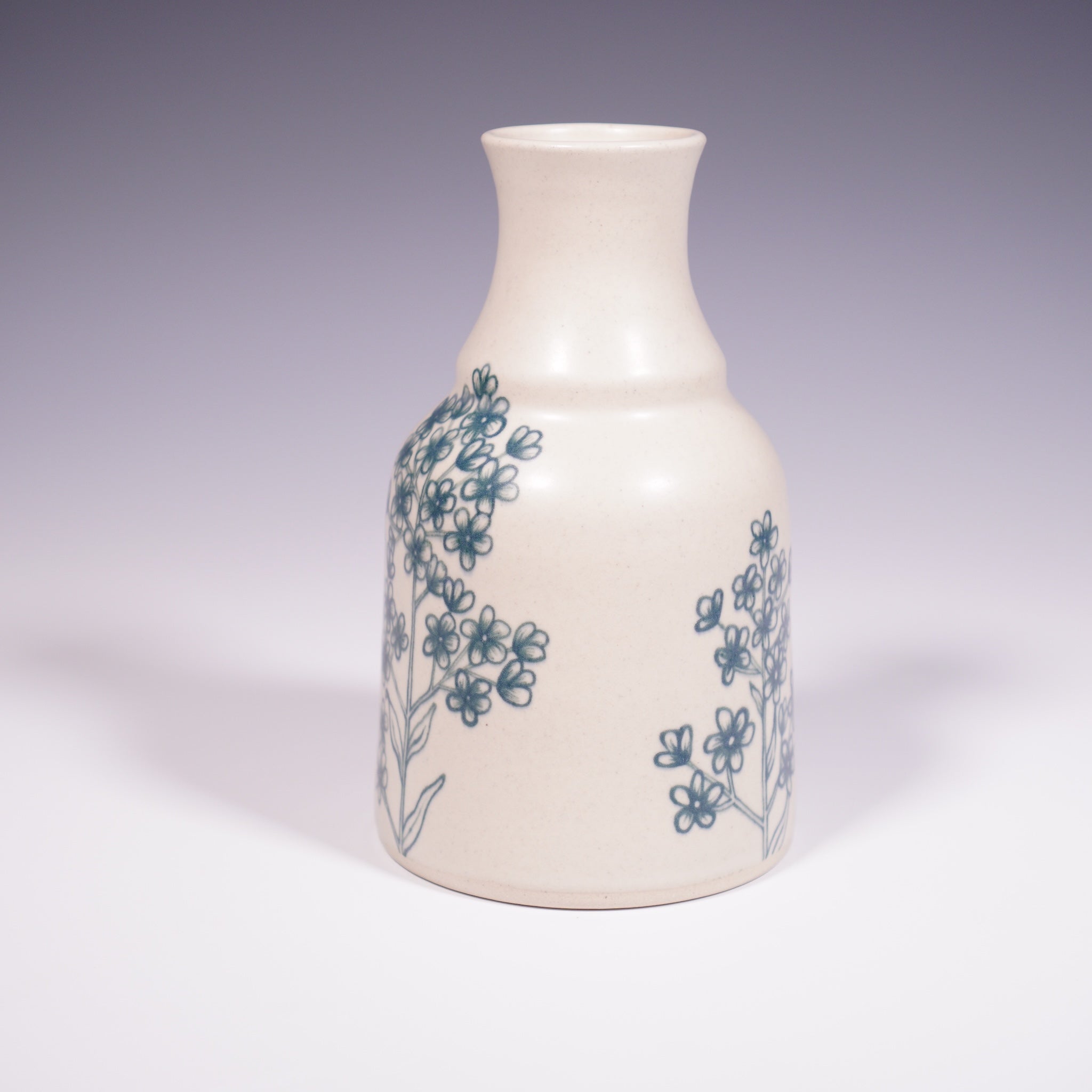 Wheel Thrown Ceramic Vase with Hand-painted Forget Me Nots Design. (Side View)