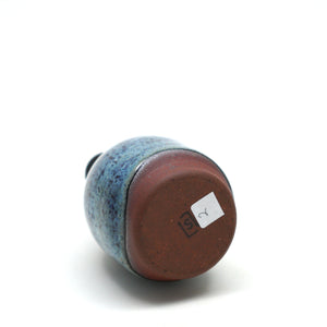 Mini ceramic vase with red clay & blue speckly glaze. Made by Living Large Small on San Juan Island, WA