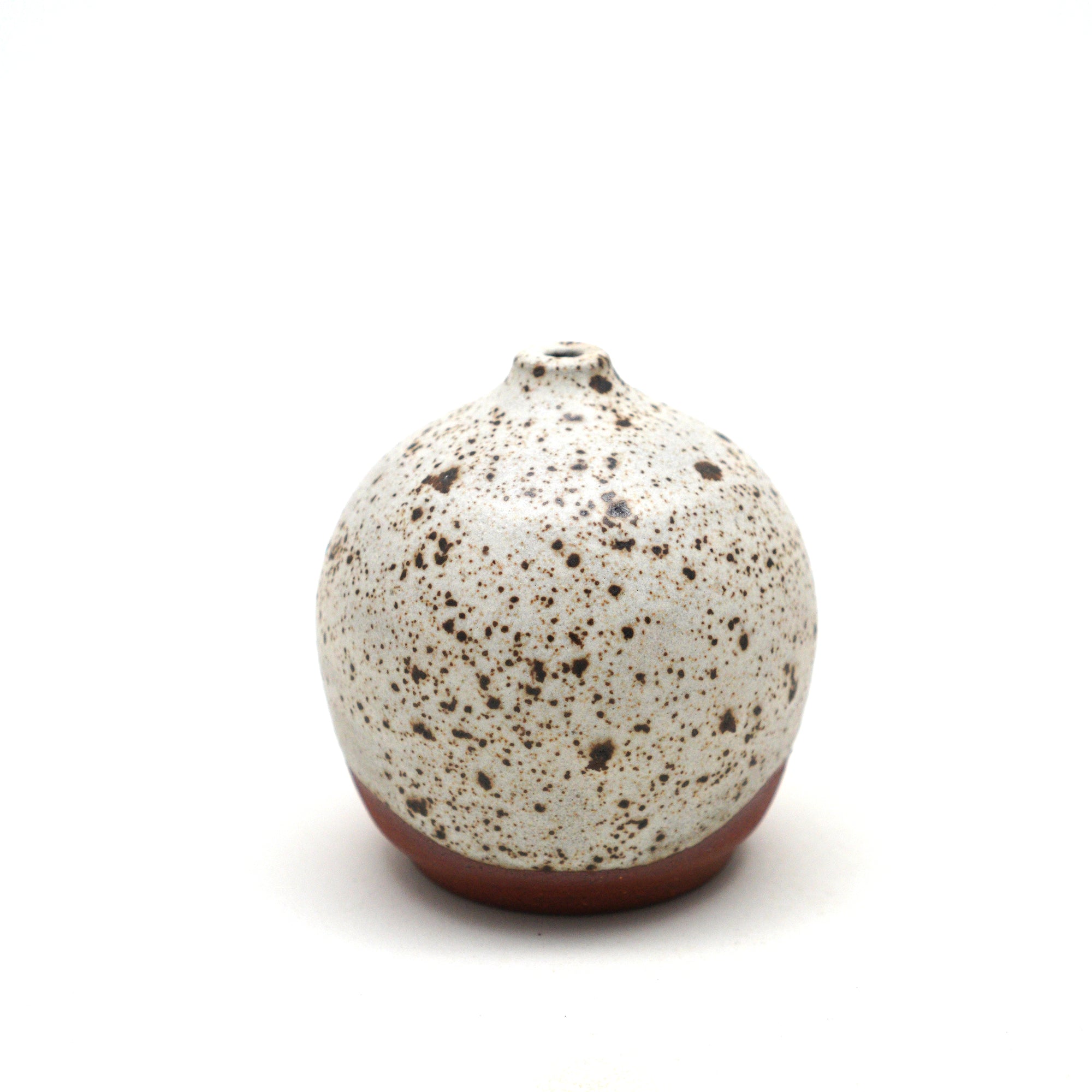 Mini ceramic vase with red clay with a white speckled matte glaze. Made by Living Large Small on San Juan Island, WA