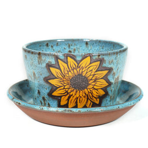 wheelthrown red stoneware planter with hand painted sunflower motif & speckled blue glaze