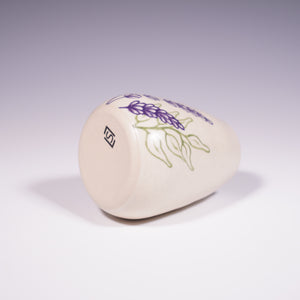Wheel Thrown Ceramic Corked Jar with Hand-Painted Lavender Design. (Bottom View)