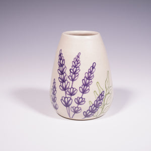Wheel Thrown Ceramic Corked Jar with Hand-Painted Lavender Design. (Front View)
