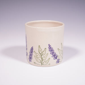 Wheel Thrown Ceramic Tumbler with Hand-Painted Lavender Design. (Side View)