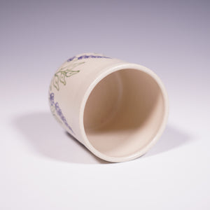 Wheel Thrown Ceramic Tumbler with Hand-Painted Lavender Design. (Top View)