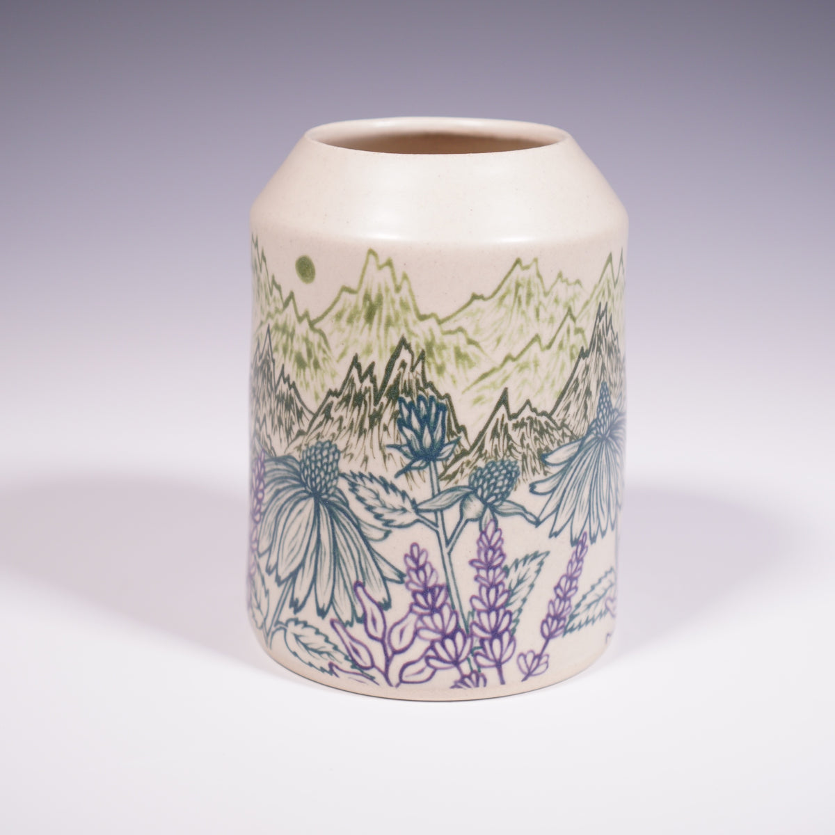 Ceramic vase with mountain and floral design on a white background (Front View)