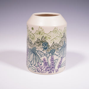 Ceramic vase with mountain and floral design on a white background (Front View)