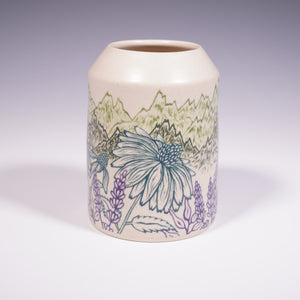 Ceramic vase with mountain and floral design on a white background (Back View)