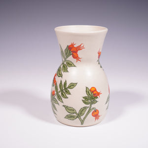 Wheel thrown ceramic vase with hand-painted rose hip underglaze design. (Back View)